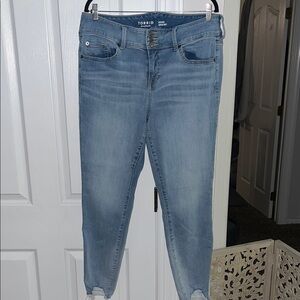 Torrid light blue distressed hem jeggings Size 16T
